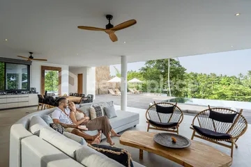 Curved Modernist Luxury Above Ubud's Jungle Canyon