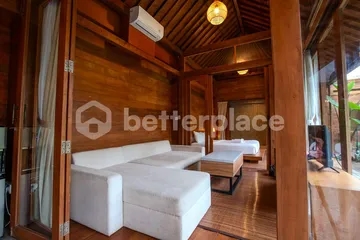Your Peaceful Escape: Yearly Rental 2 Bed Villa with Wooden Lodge Design and Lush Views in Tabanan