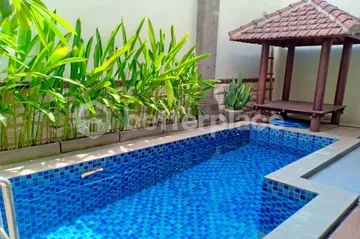 Contemporary Kerobokan Villa for Yearly Rental, Showcasing Elegant Design and Generous Family Living Spaces