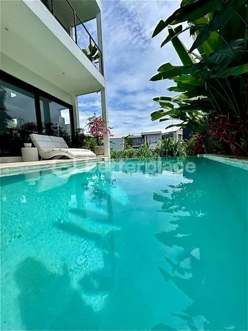 A Distinctive Canggu Retreat – Two-Bedroom Villa Featuring Dramatic Ceilings, Rooftop Grill, and Private Pool